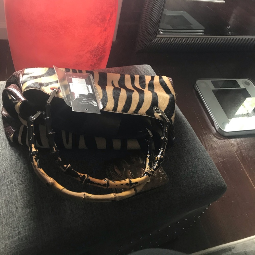 Leather handbag with bamboo handles
